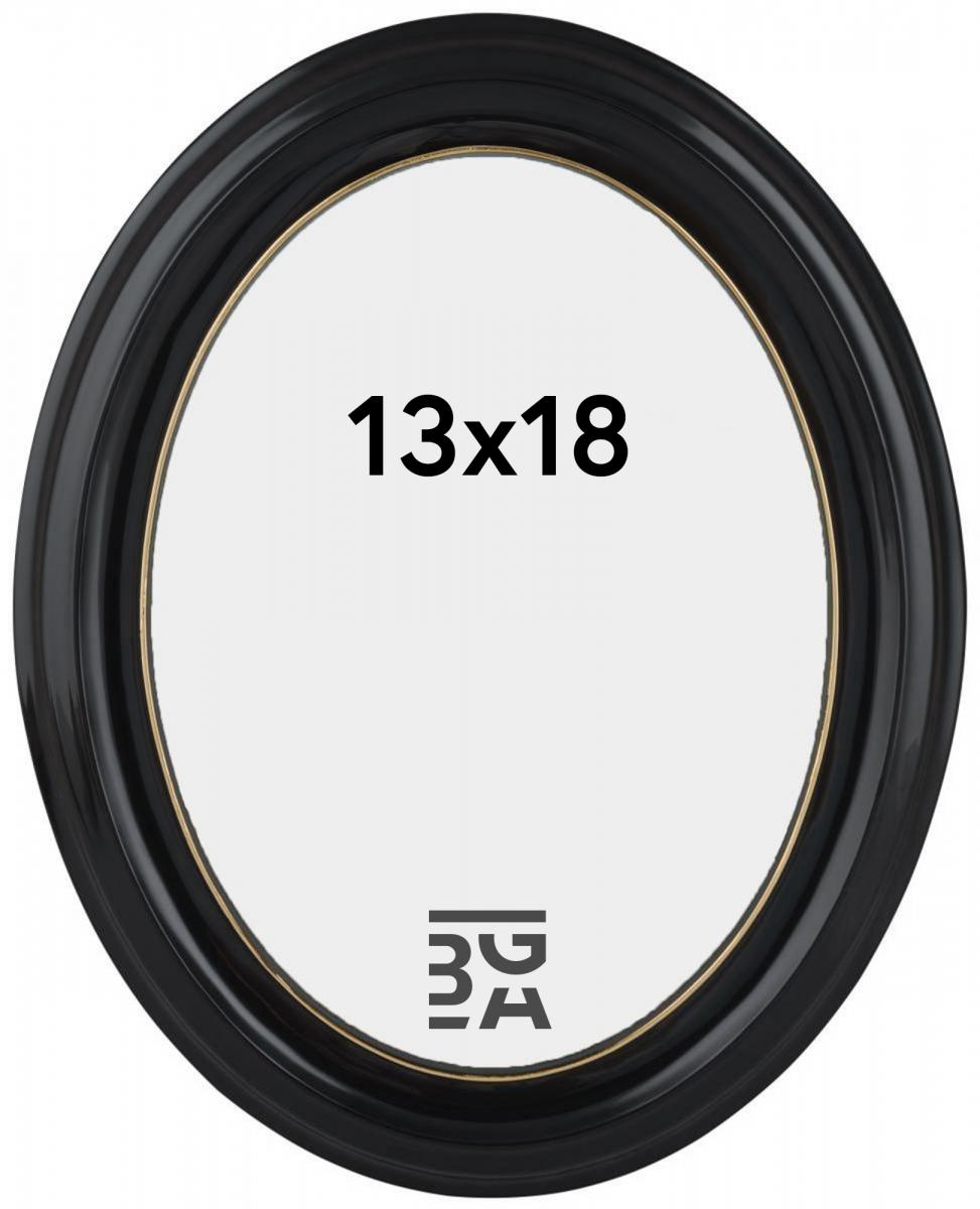 Ovaalinmuotoinen musta kehys 13x18 kokoiselle kuvalle, täydellinen klassiseen tauluseinään perheestä