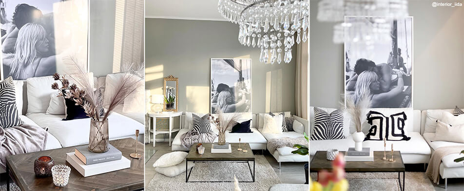 Valkoinen suuri valokuvakehys mustavalkoisella valokuvalla vaaleassa olohuoneessa