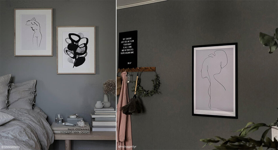 Vaaleat, graafiset julisteet tummilla seinillä